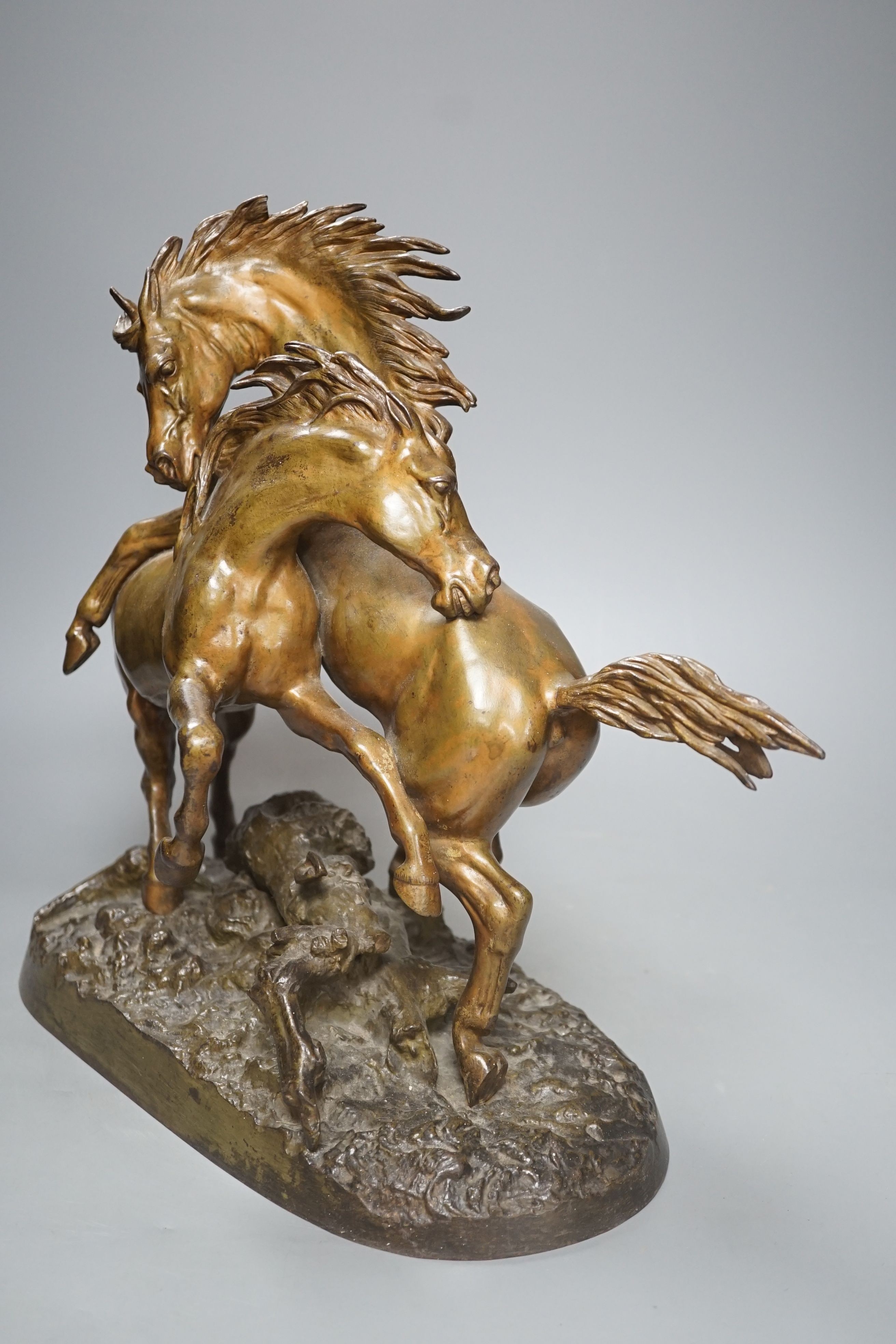An Animalier bronze of two horses-44cm wide